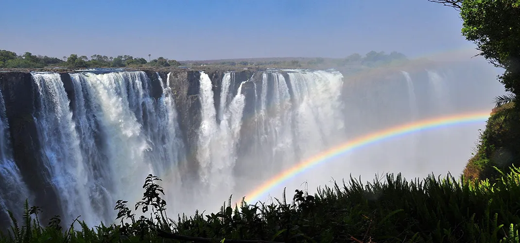 Rainbow and Victoria Falls, Zimbabwe Victoria Falls, Zimbabwe